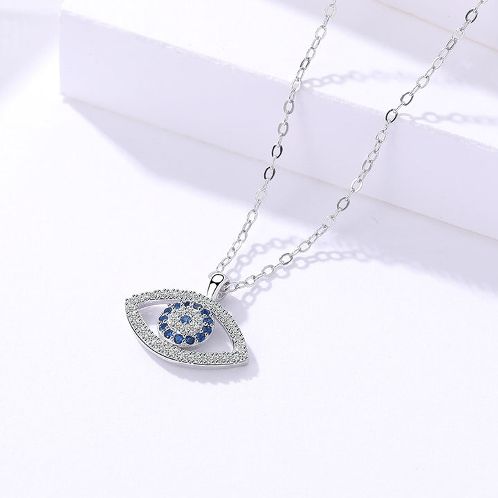 Silver evil eye pendant necklace with blue zircon
