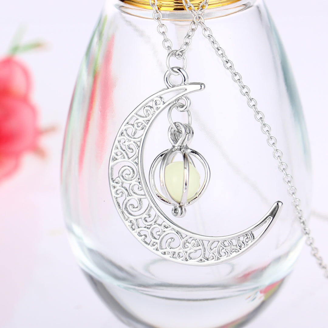 Crescent moon necklace with glowing stone