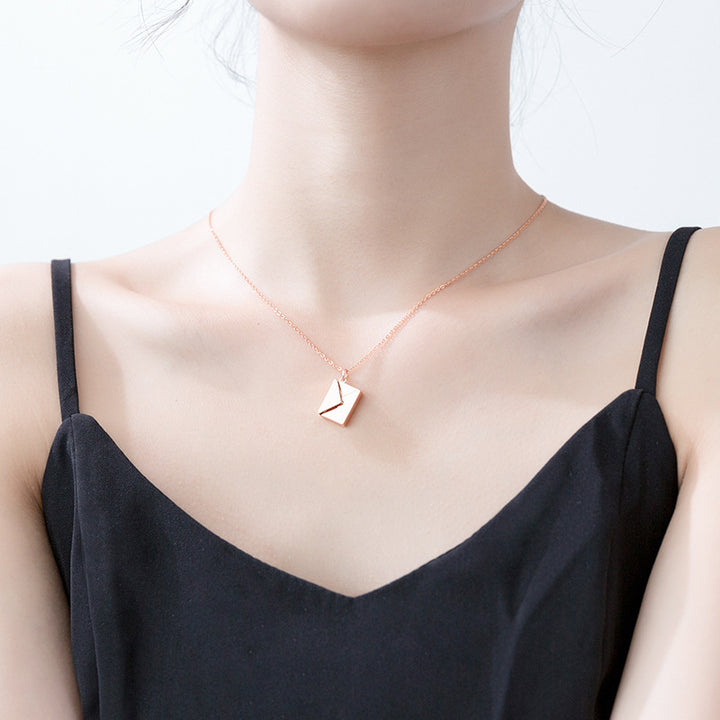 Silver envelope locket necklace with letter card