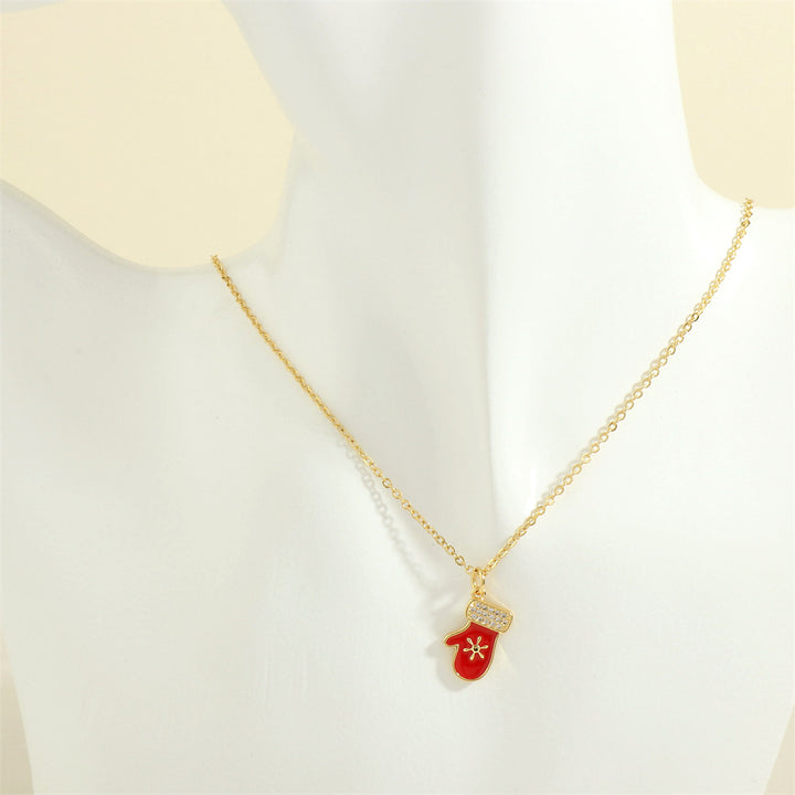 Gold enamel Christmas charm necklace with rhinestones