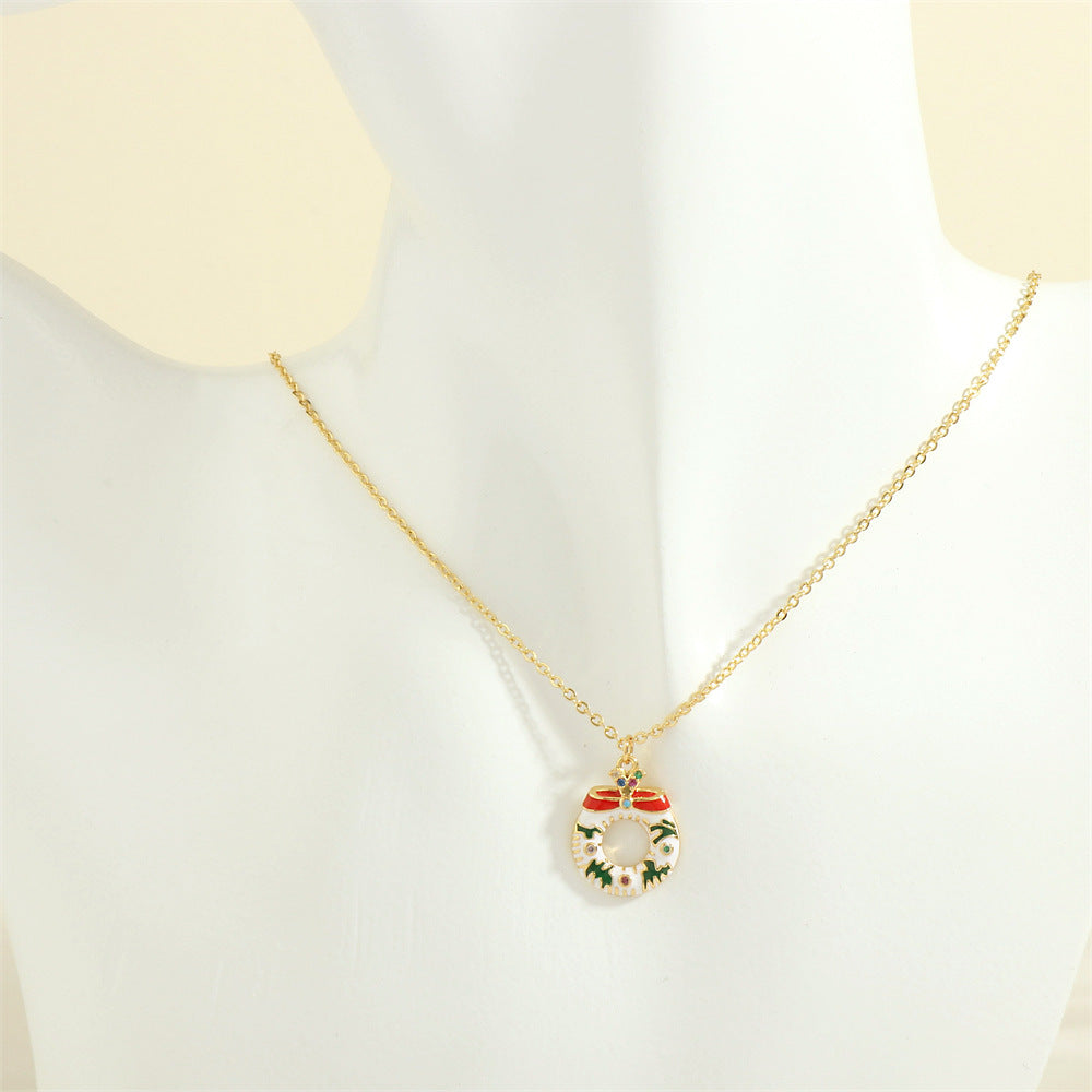 Gold enamel Christmas charm necklace with rhinestones