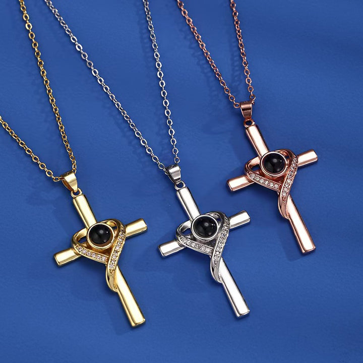 Gold cross heart projection necklace