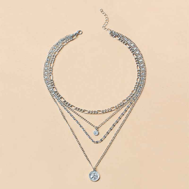 Gold layered coin charm necklace
