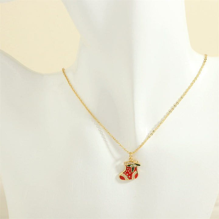 Gold enamel Christmas charm necklace with rhinestones