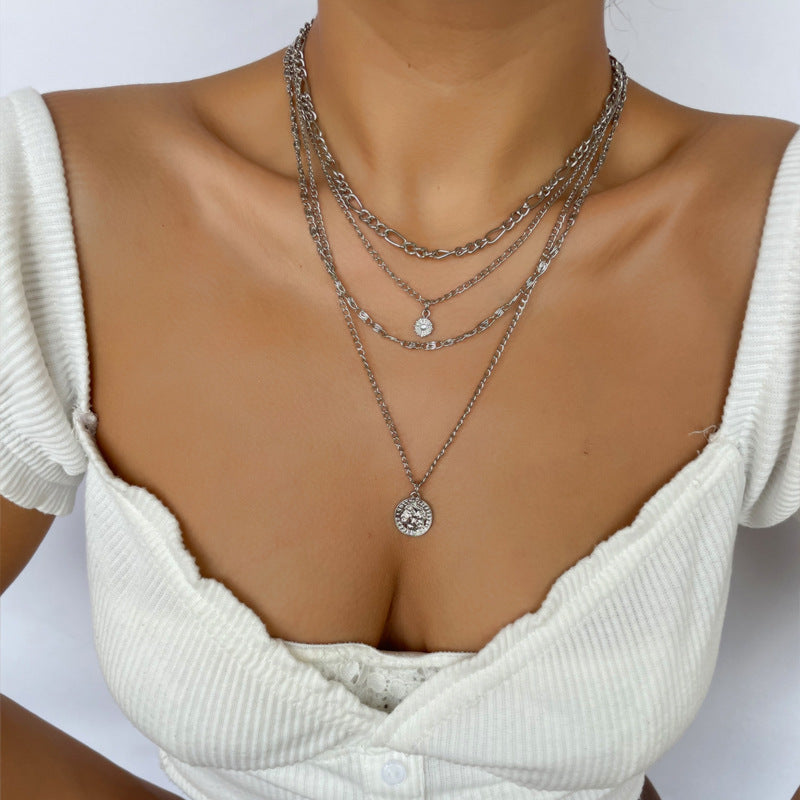 Gold layered coin charm necklace