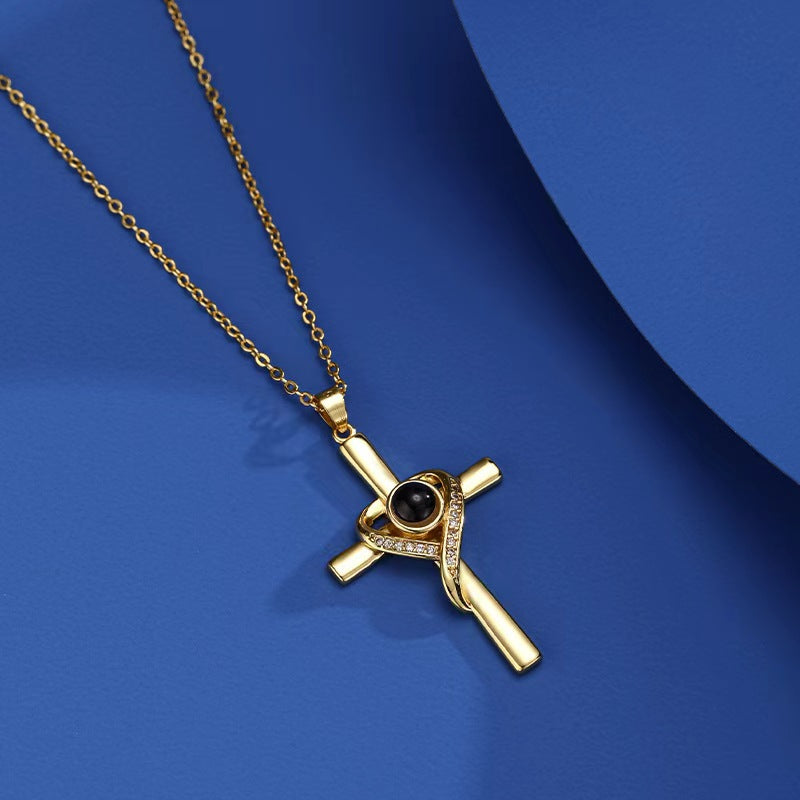 Gold cross heart projection necklace