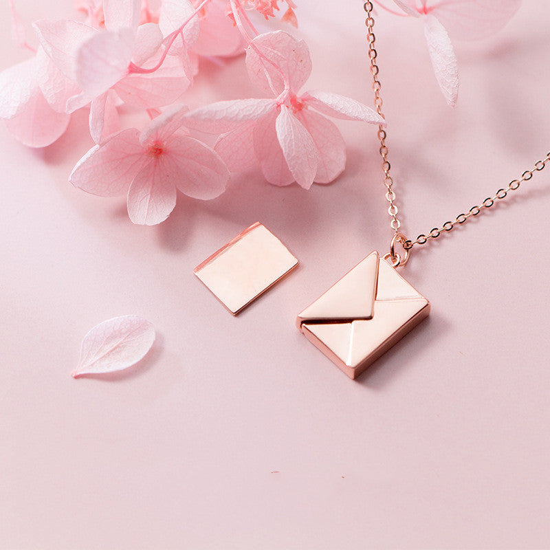 Silver envelope locket necklace with letter card