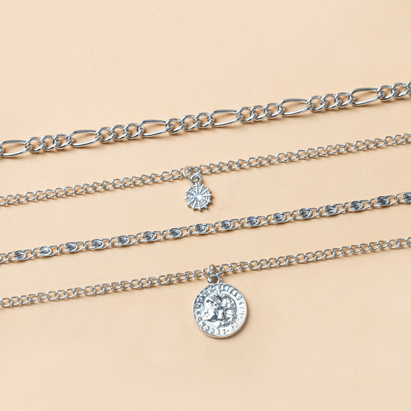 Gold layered coin charm necklace